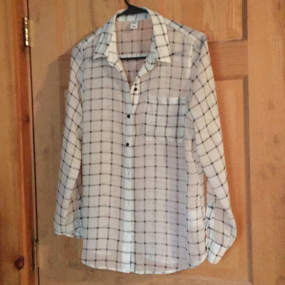 Sheer white blouse with black stripes